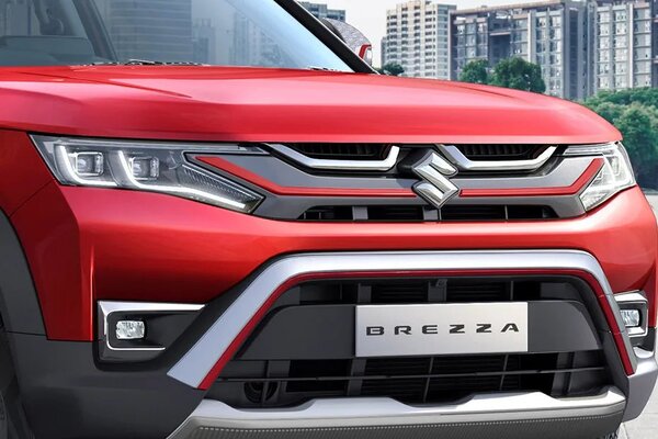 Brezza Zxi Plus Dual Tone on road Price